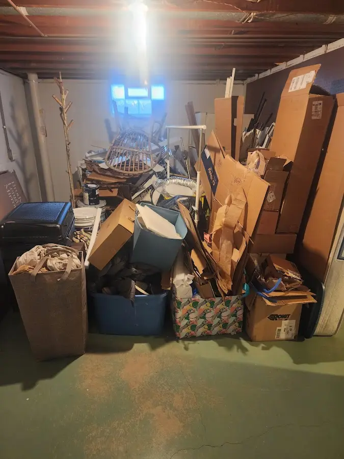 Roll-off dumpster container at job site for Construction Dumpster Rental in Green